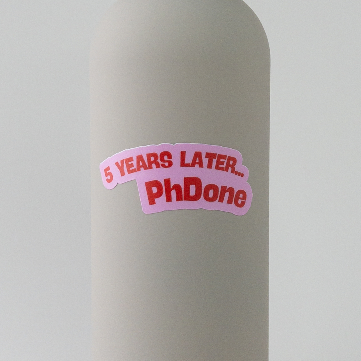 phdone sticker for graduating phd in red and pink