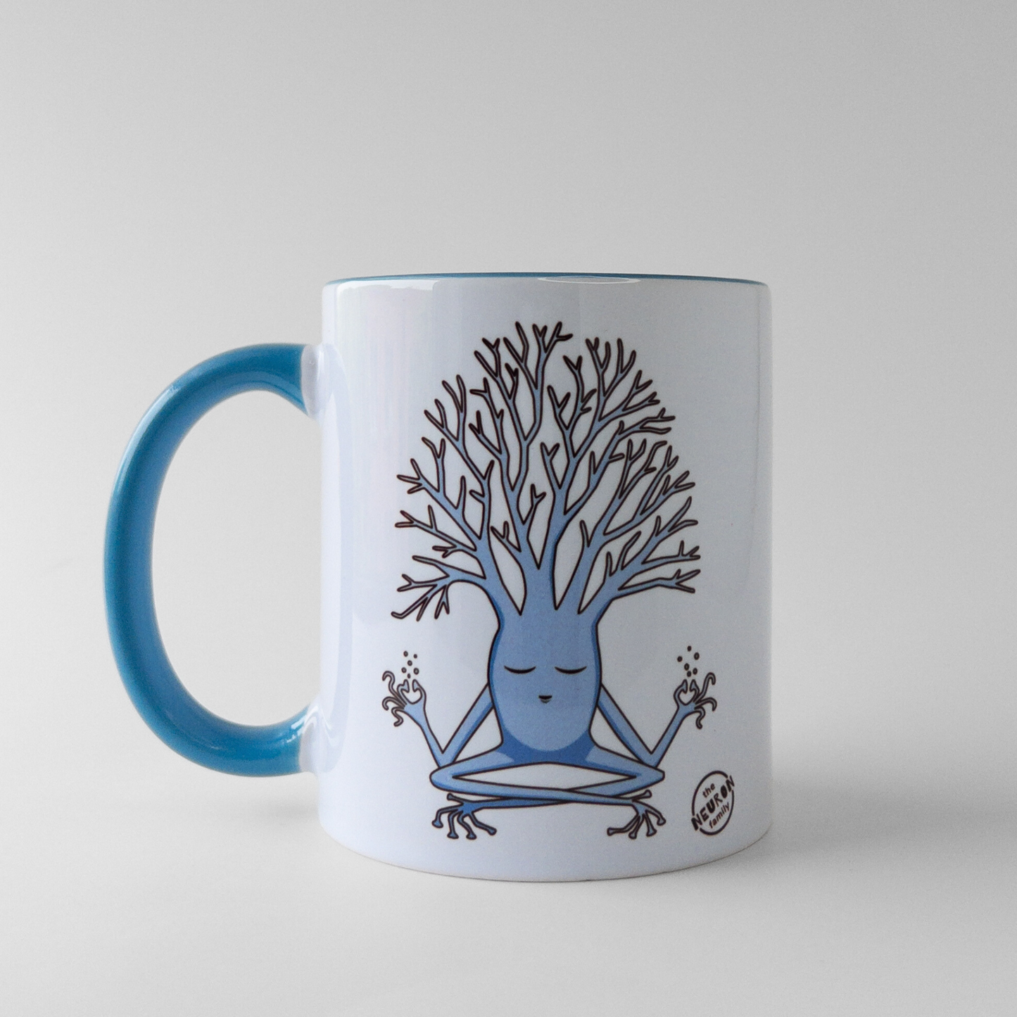 Meditation neuron from the Neuron Family on a light blue mug